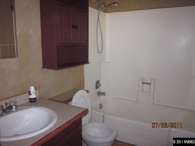 188 Ring Road Dayton, NV 89403 - Photo 7 of 9 a bathroom with a sink toilet and shower