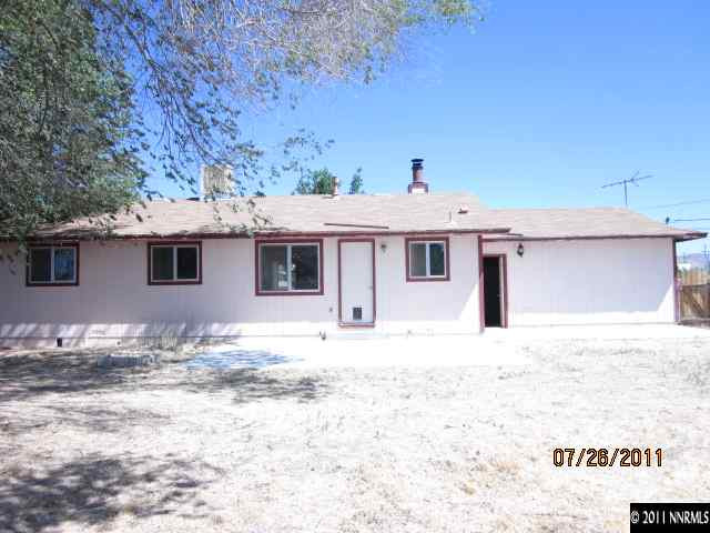 188 Ring Road Dayton, NV 89403 - Photo 9 of 9 a front view of a house with a yard