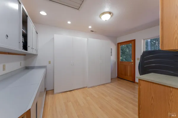 a view of a livingroom with wooden floor