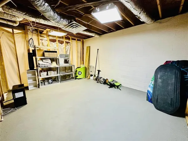a bedroom with a bed and a white walk in closet