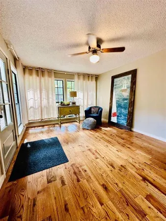 a kitchen with stainless steel appliances granite countertop a refrigerator a stove and a sink