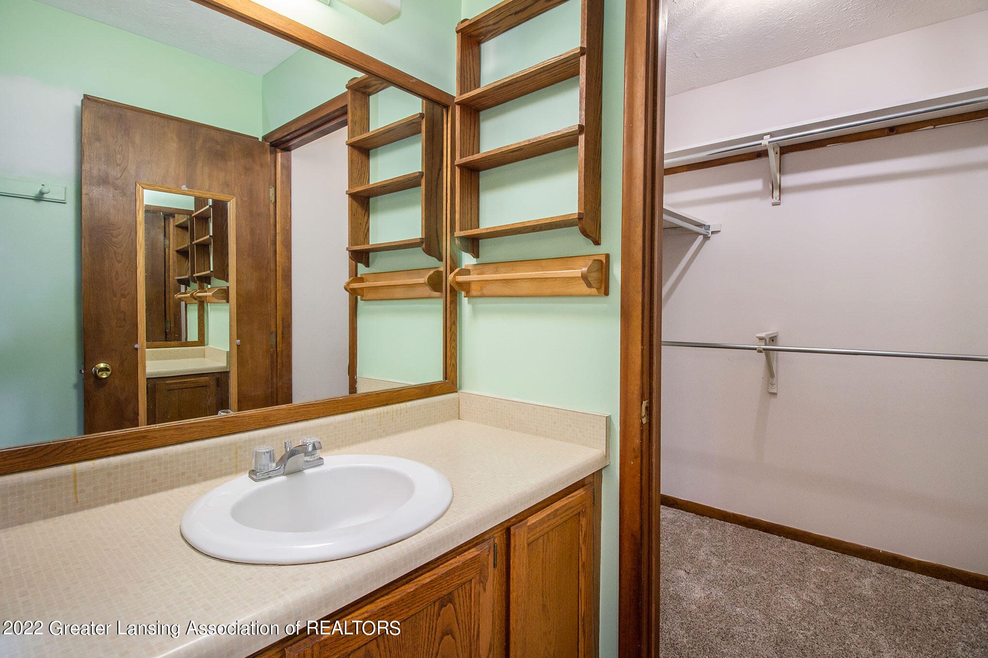 1967 Hawley Road Mason, MI 48854 - Photo 22 of 37 Bathroom & Walk-in Closet