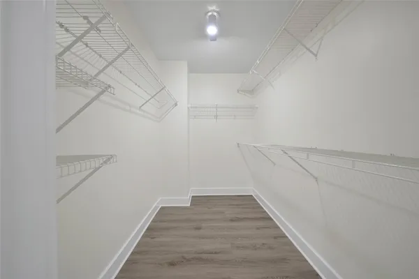 a view of a room with racks on the wall