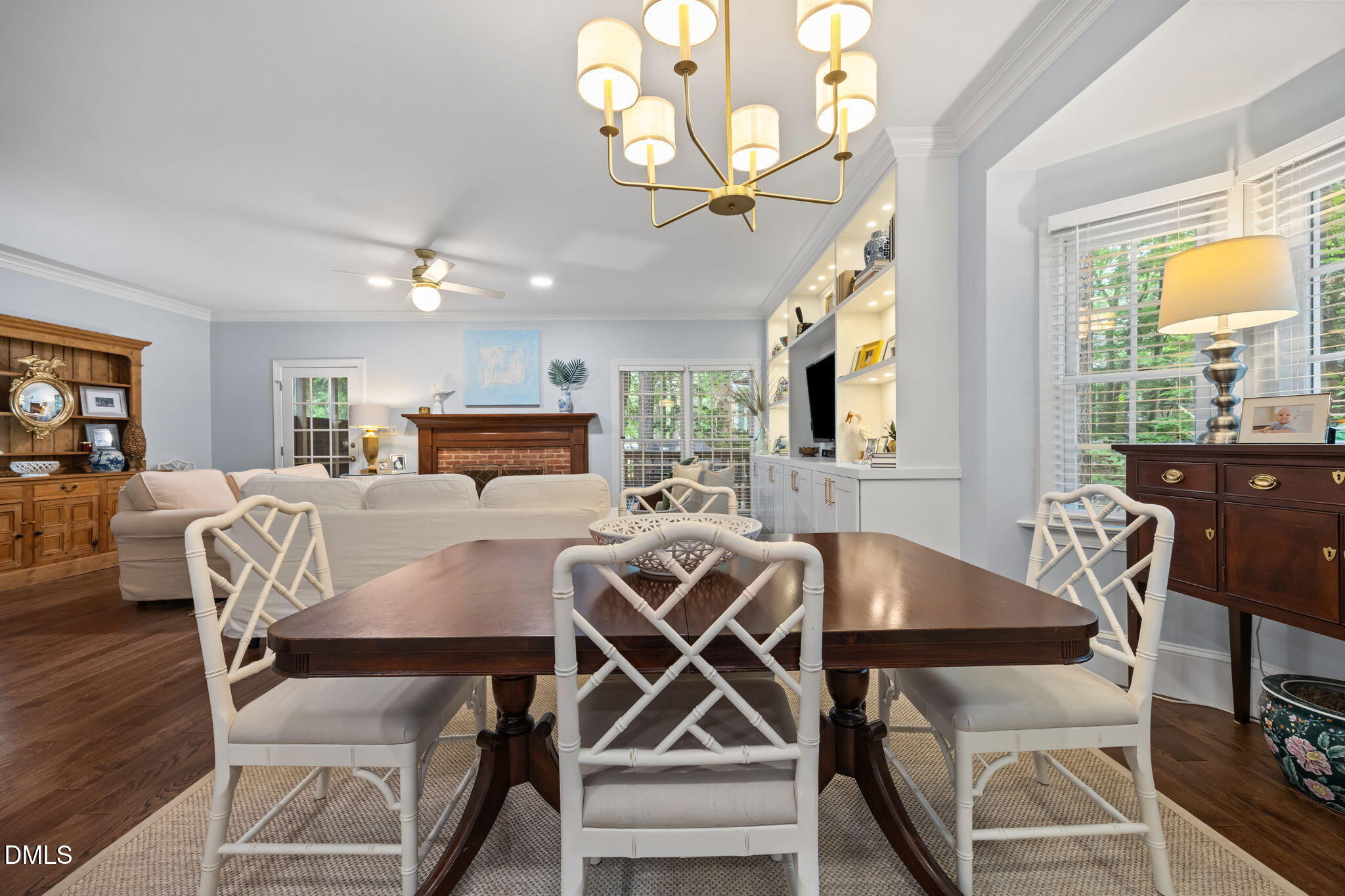 562 Weathergreen Drive Raleigh, NC 27615 - Photo 10 of 47 a view of a dining room with furniture window and wooden floor