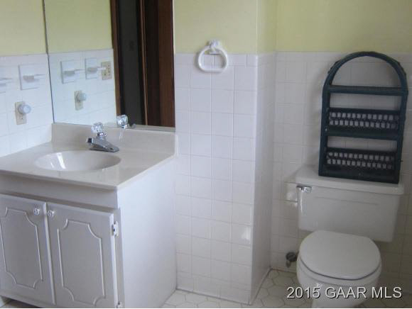753 Ladd Road Fishersville, VA 22939 - Photo 13 of 25 a bathroom with a toilet a sink and a mirror