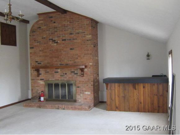 753 Ladd Road Fishersville, VA 22939 - Photo 21 of 25 an empty room with fireplace