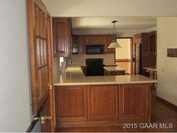 753 Ladd Road Fishersville, VA 22939 - Photo 7 of 25 a kitchen with a refrigerator and microwave