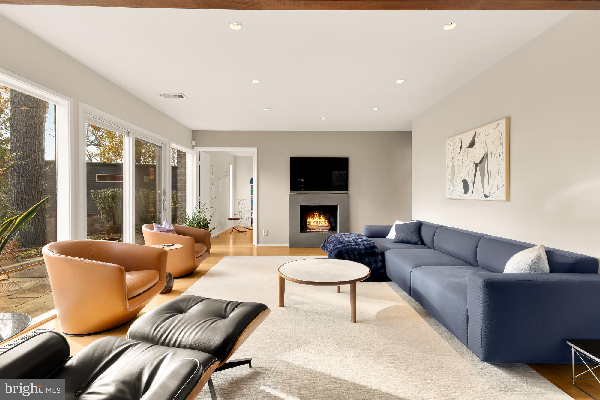5420 Mohican Road Bethesda, MD 20816 - Photo 14 of 71 a living room with furniture fireplace and a flat screen tv