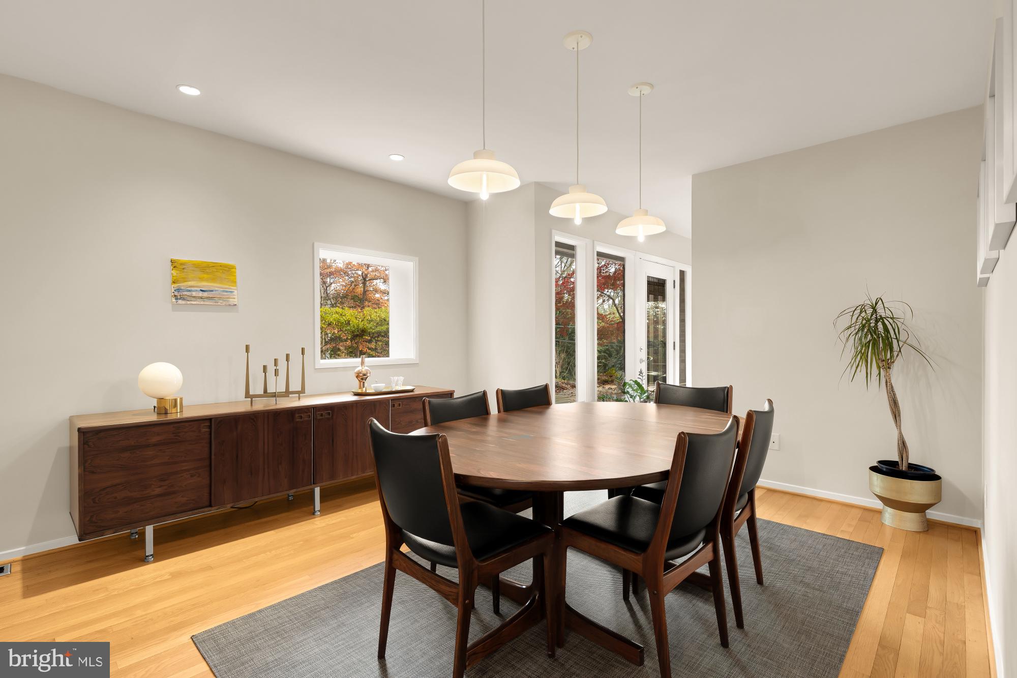 5420 Mohican Road Bethesda, MD 20816 - Photo 17 of 71 a view of a dining room with furniture and wooden floor
