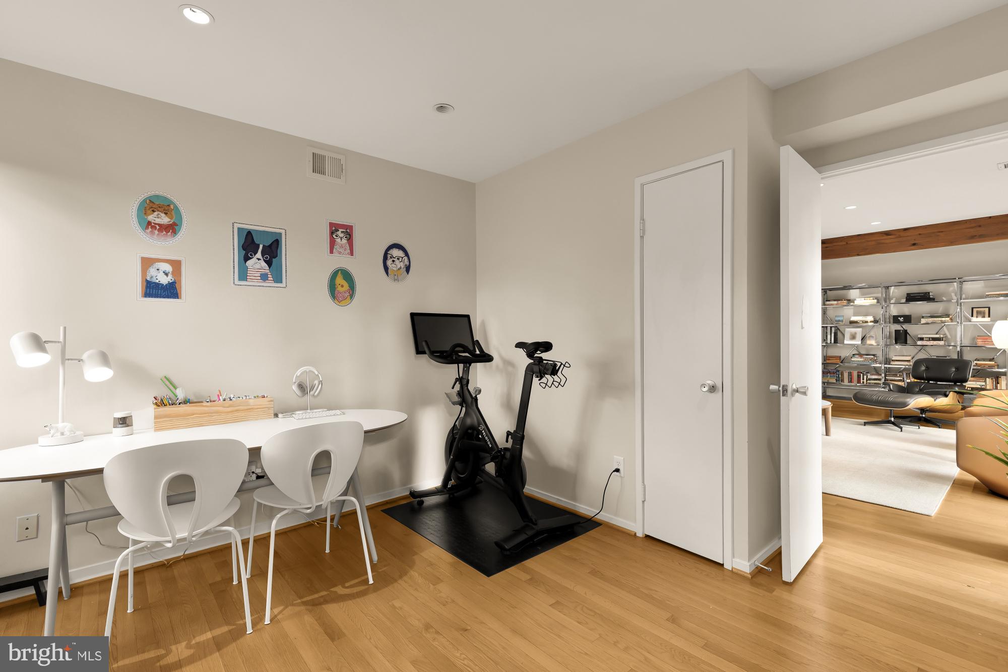 5420 Mohican Road Bethesda, MD 20816 - Photo 28 of 71 a view of a workspace with furniture and wooden floor