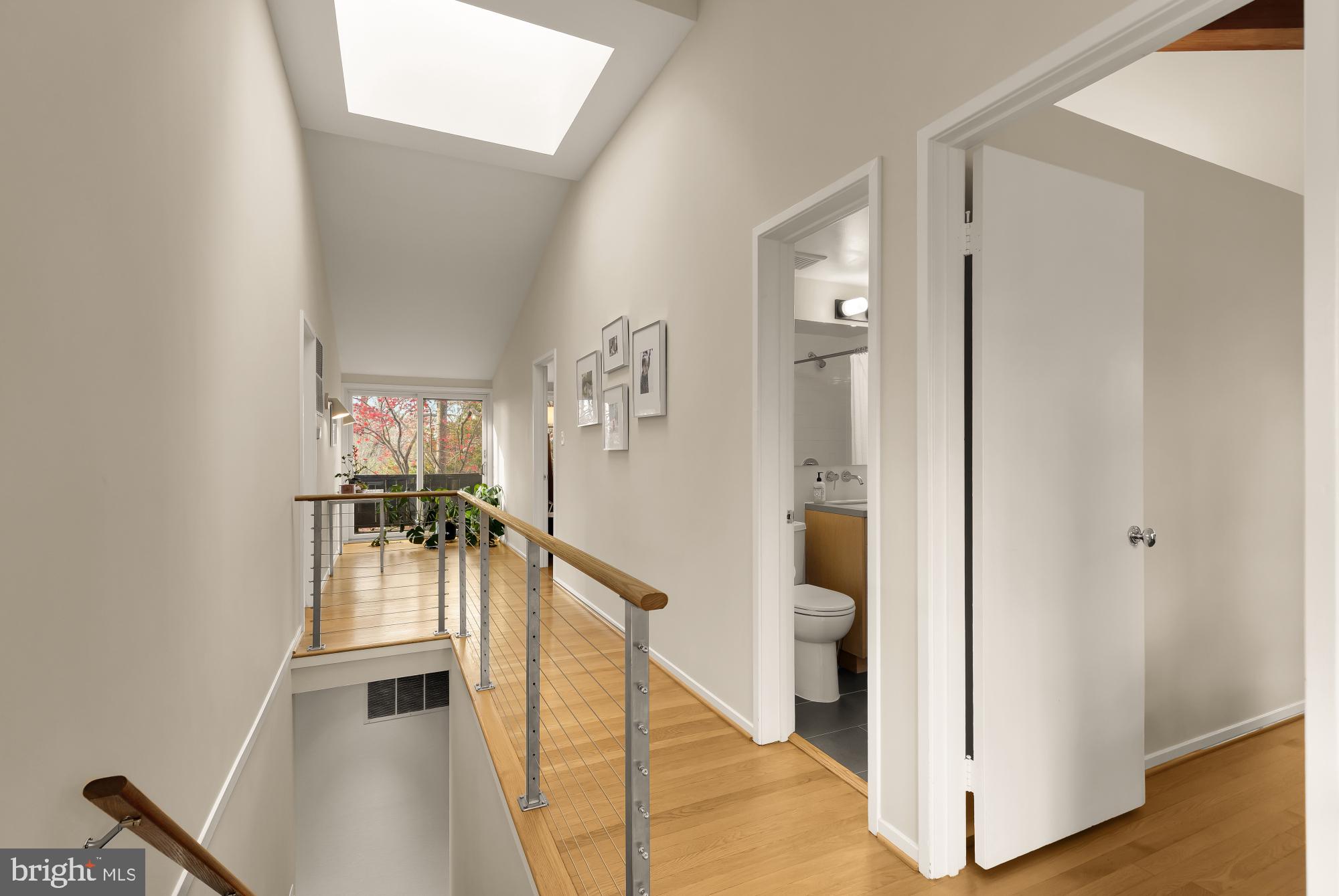 5420 Mohican Road Bethesda, MD 20816 - Photo 30 of 71 a view of an entryway with wooden floor and a livingroom view