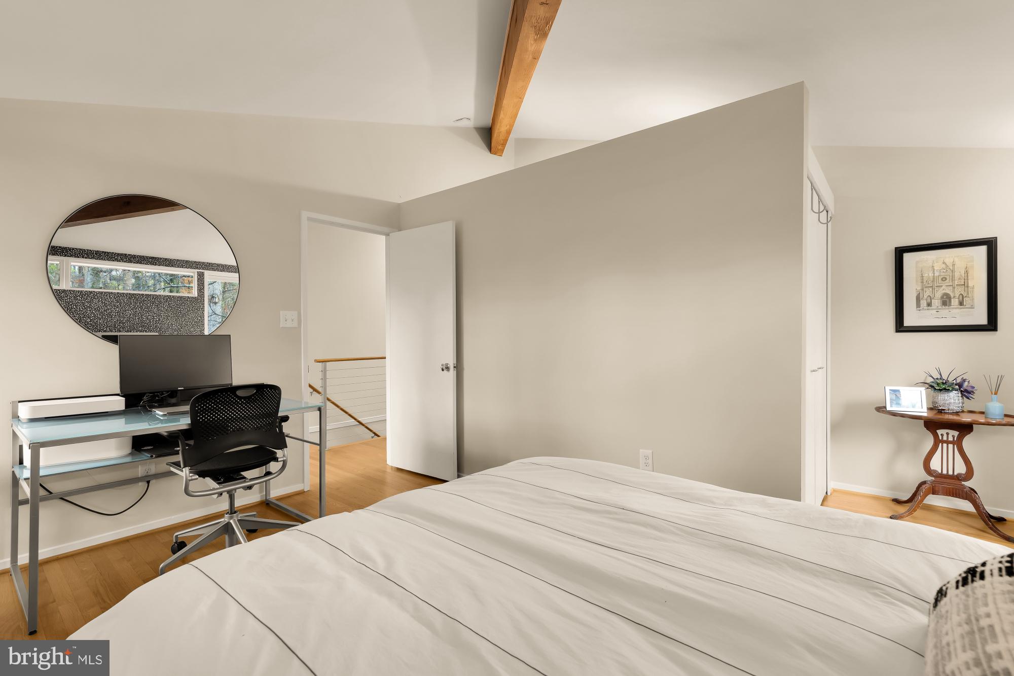 5420 Mohican Road Bethesda, MD 20816 - Photo 32 of 71 a bedroom with a bed and a chair