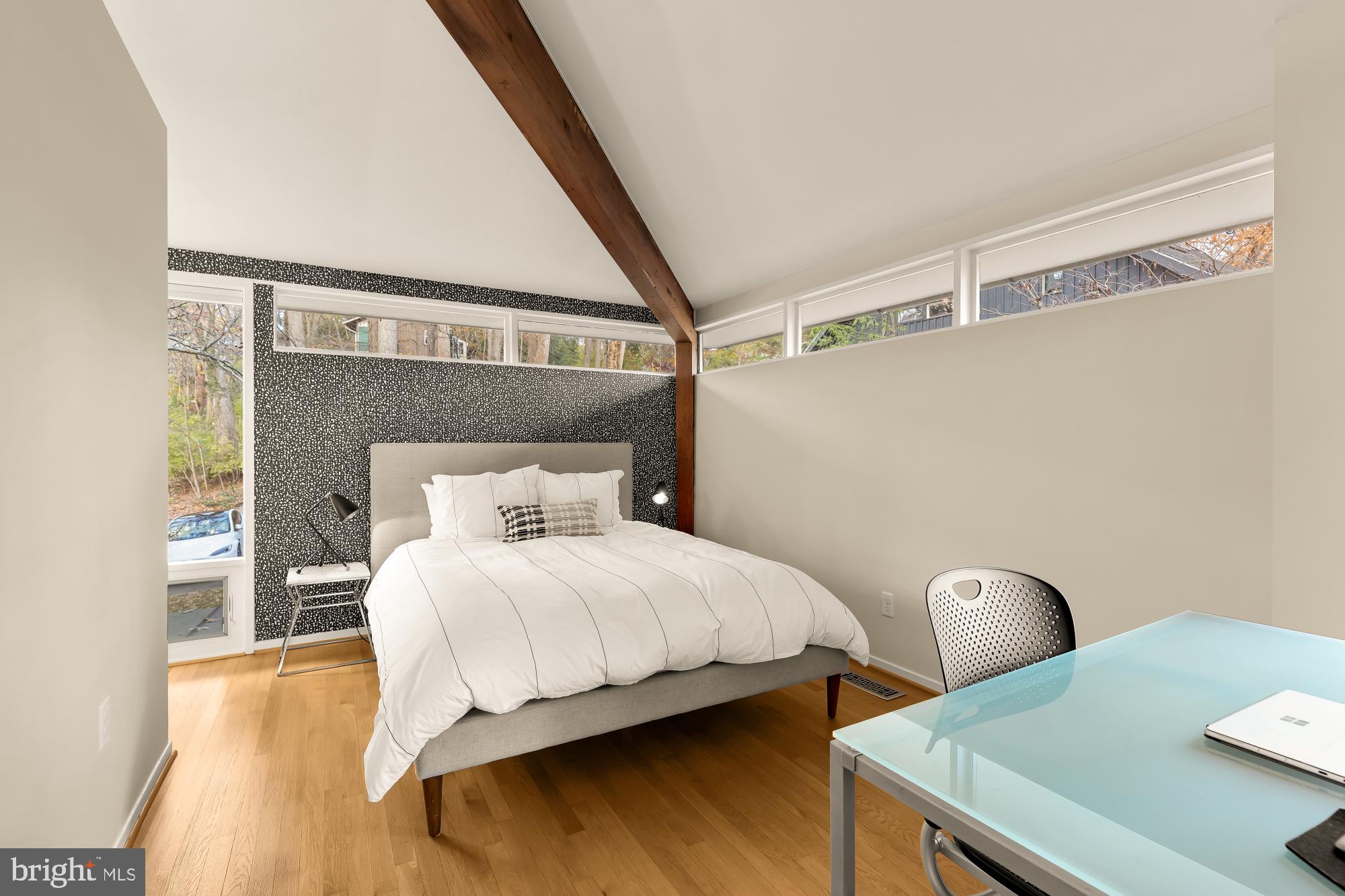 5420 Mohican Road Bethesda, MD 20816 - Photo 36 of 71 a bedroom with a bed and a table