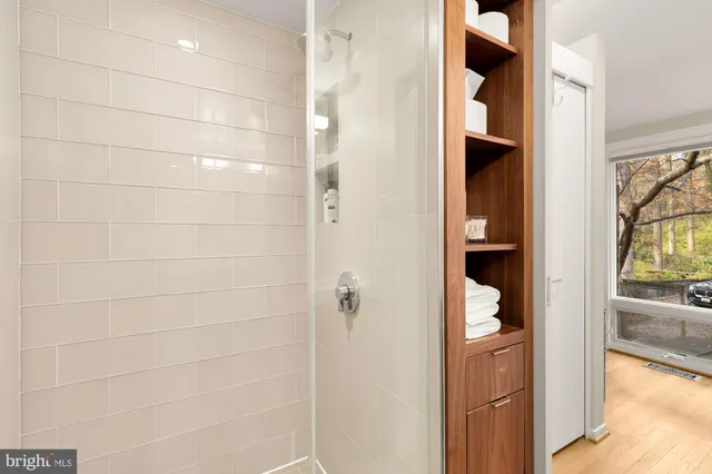 a bedroom with furniture and flat screen tv