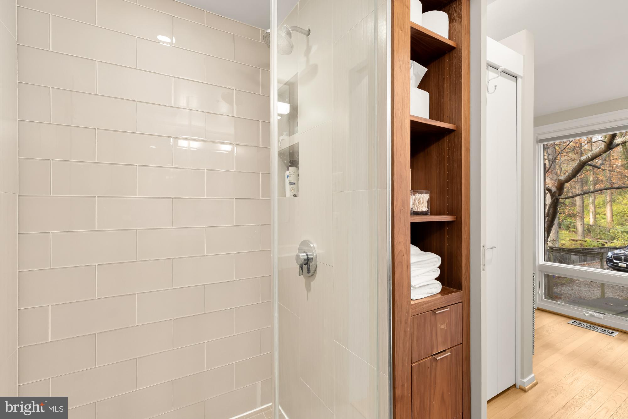 5420 Mohican Road Bethesda, MD 20816 - Photo 38 of 71 a bathroom with a shower and toilet