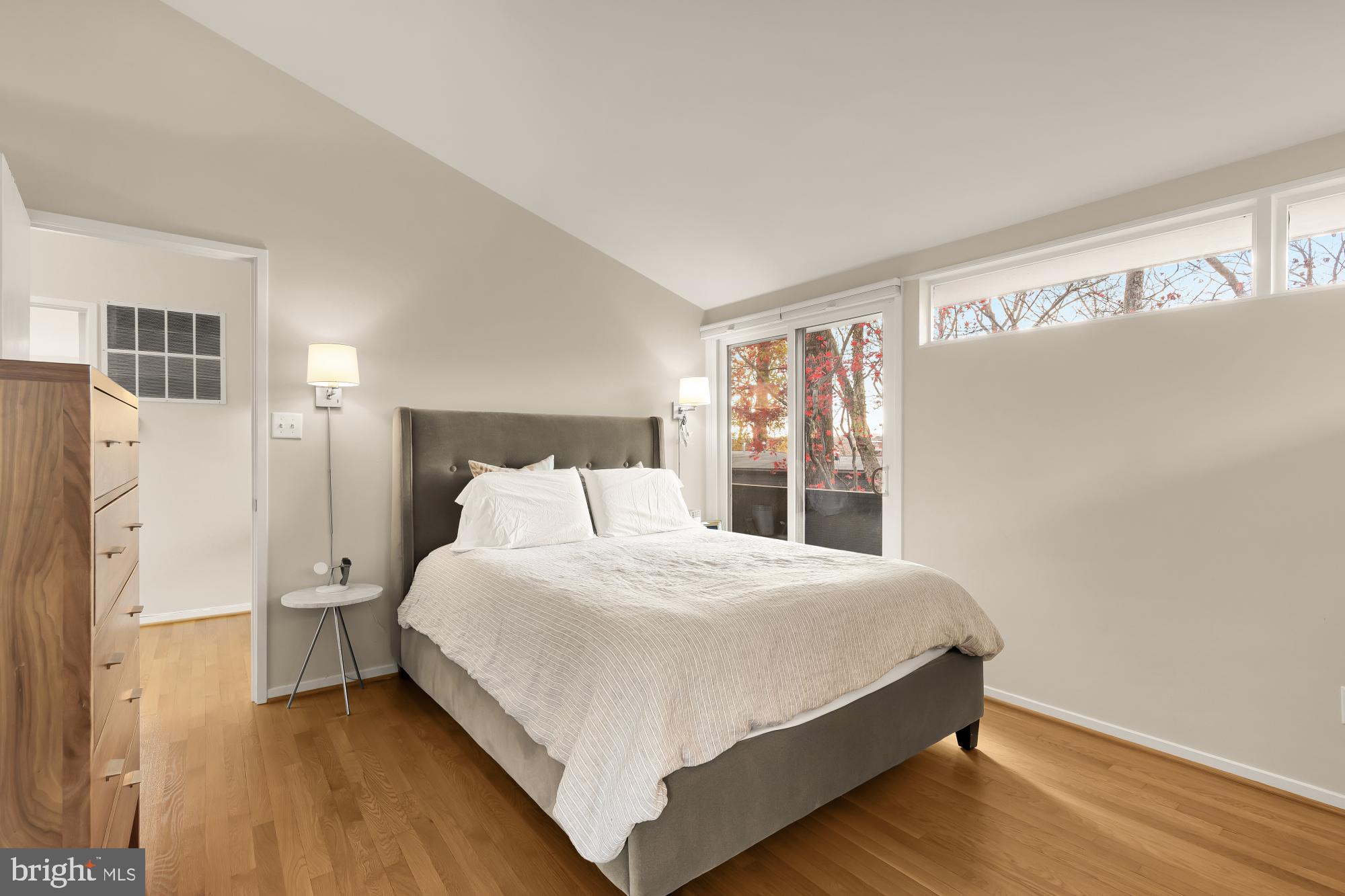 5420 Mohican Road Bethesda, MD 20816 - Photo 45 of 71 a large bed sitting in a bedroom next to a window