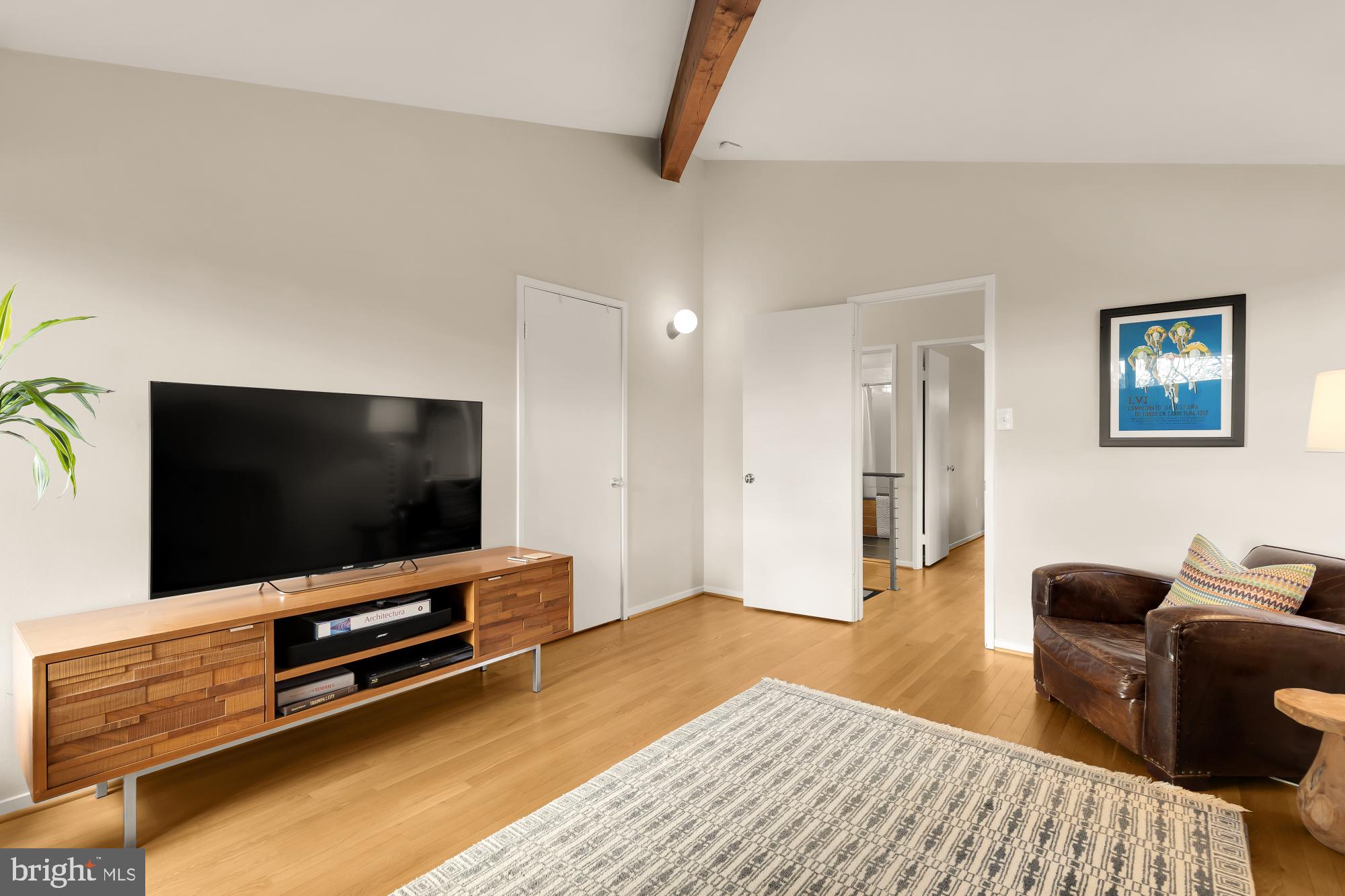 5420 Mohican Road Bethesda, MD 20816 - Photo 49 of 71 a living room with furniture and a flat screen tv