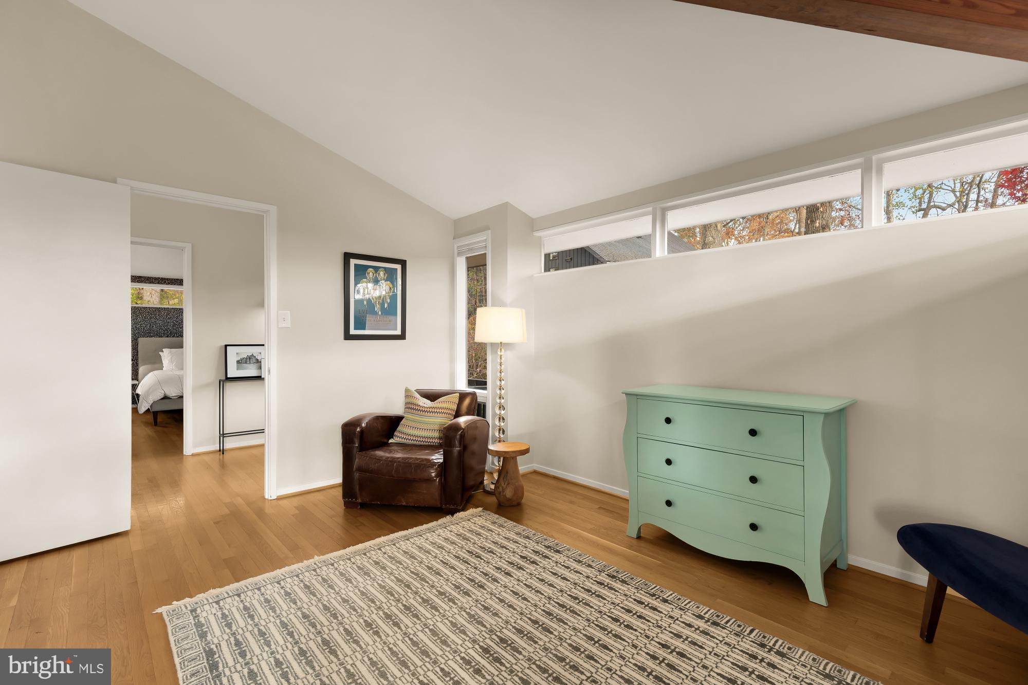 5420 Mohican Road Bethesda, MD 20816 - Photo 50 of 71 a bedroom with a bed and a dresser