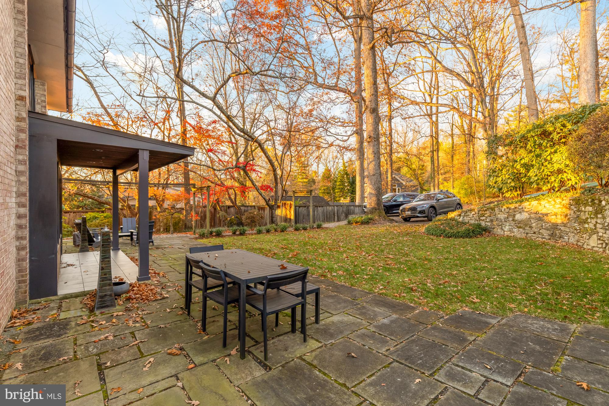 5420 Mohican Road Bethesda, MD 20816 - Photo 66 of 71 a backyard of a house with table and chairs