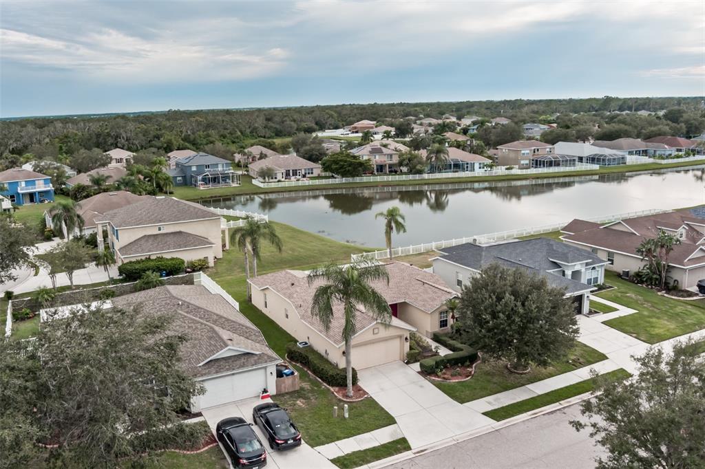 11347 Walden Loop Parrish, FL 34219 - Photo 19 of 29 an aerial view of residential houses with outdoor space and river
