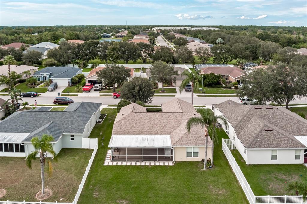 11347 Walden Loop Parrish, FL 34219 - Photo 20 of 29 an aerial view of a house with garden space and street view