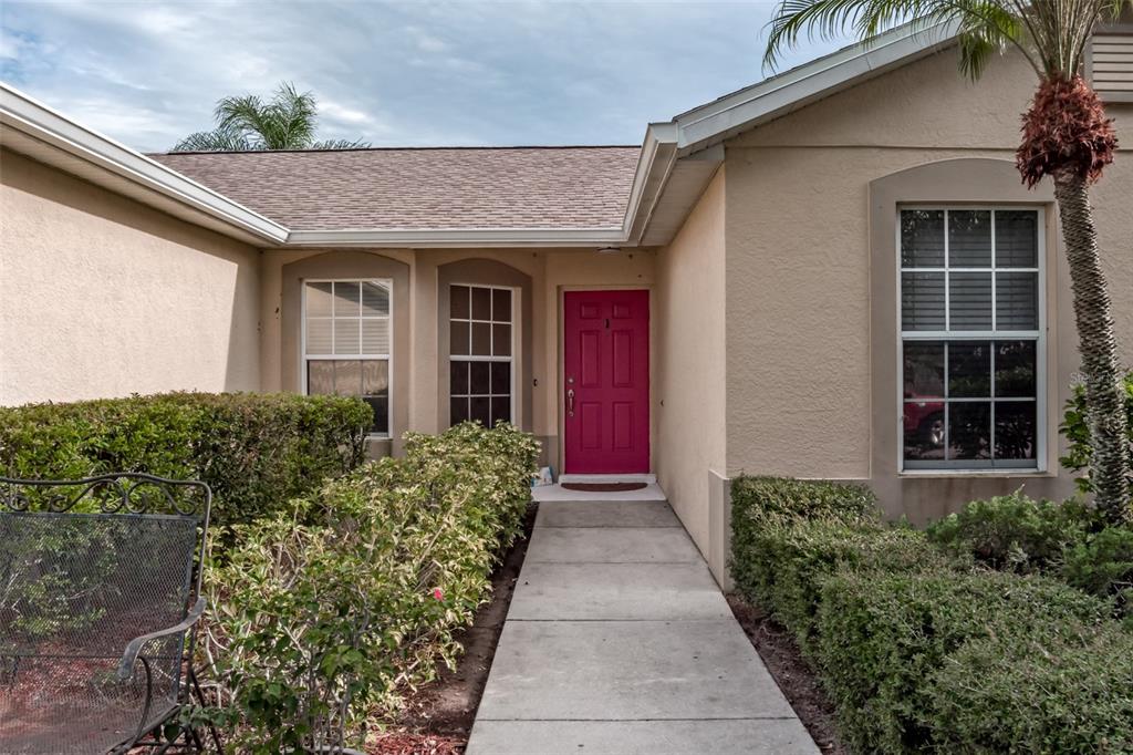 11347 Walden Loop Parrish, FL 34219 - Photo 2 of 29 a front view of a house with a yard