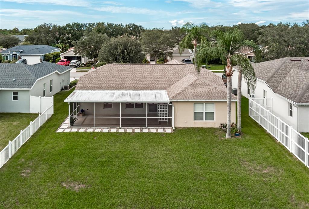 11347 Walden Loop Parrish, FL 34219 - Photo 21 of 29 a aerial view of a house next to a big yard