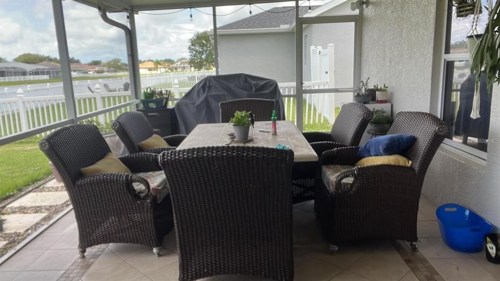 11347 Walden Loop Parrish, FL 34219 - Photo 25 of 29 a living room with furniture and a potted plant