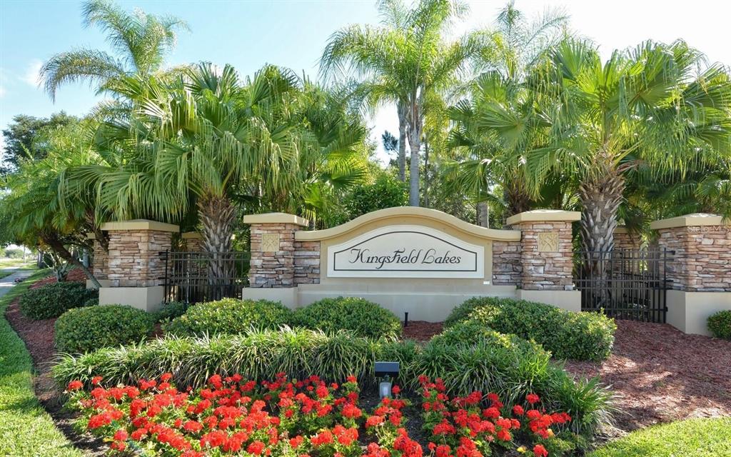 11347 Walden Loop Parrish, FL 34219 - Photo 27 of 29 a sign that is sitting in front of flowers