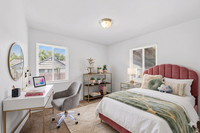 7879 Oak Street Midvale, UT 84047 - Photo 12 of 32 Bright interior space featuring a window, light-colored walls, and a ceiling-mounted light fixture