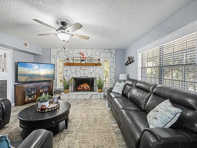 a living room with furniture and a couch