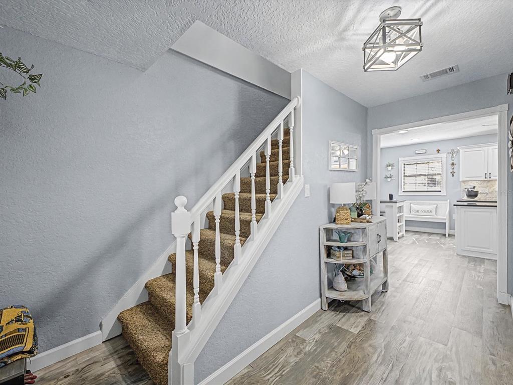 24420 Lanark Road Brooksville, FL 34601 - Photo 20 of 56 a view of livingroom with furniture and windows