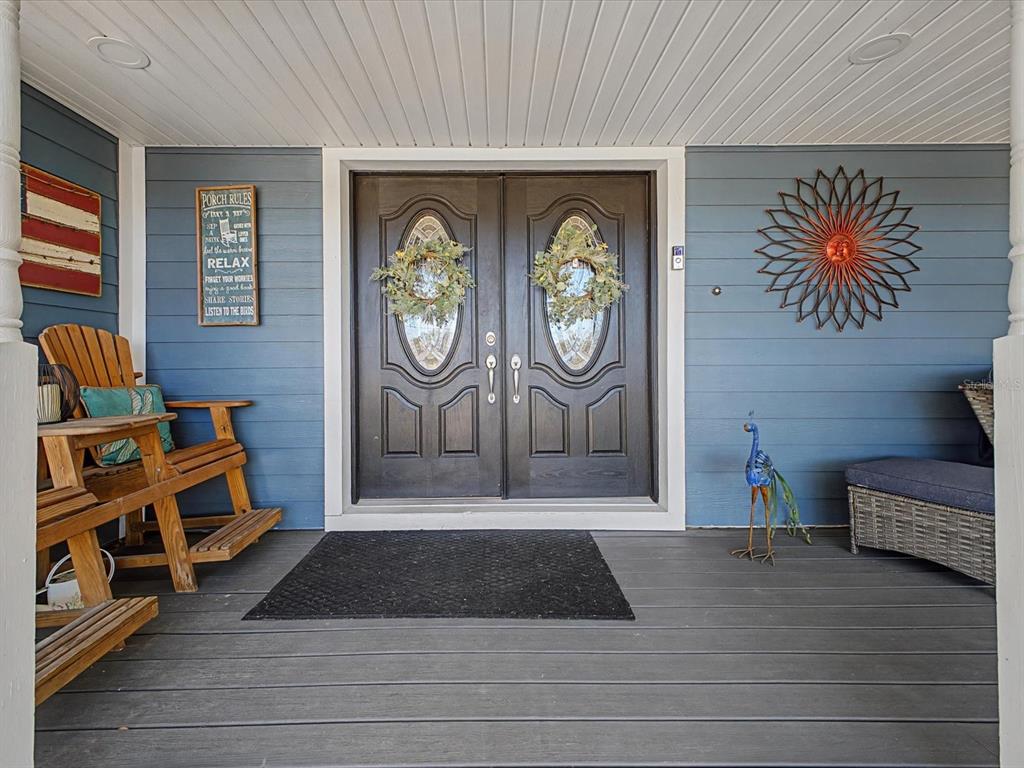 24420 Lanark Road Brooksville, FL 34601 - Photo 30 of 56 a view of a entryway door of the house