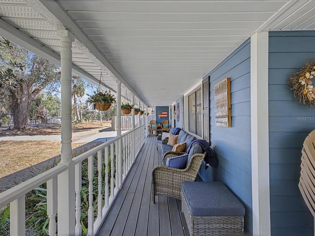 24420 Lanark Road Brooksville, FL 34601 - Photo 32 of 56 a view of two chairs in the balcony