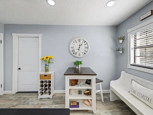 a kitchen with stainless steel appliances a stove a sink a stove a microwave and cabinets