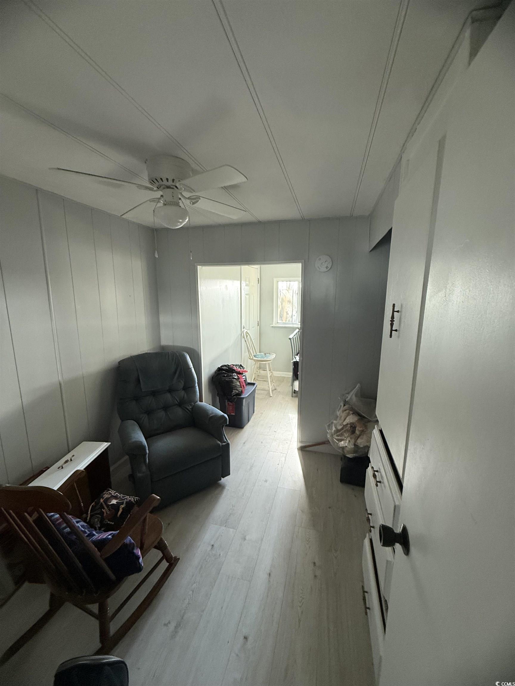2945 Clemson Trail Murrells Inlet, SC 29576 - Photo 15 of 23 Living area featuring light wood-style flooring and a ceiling fan