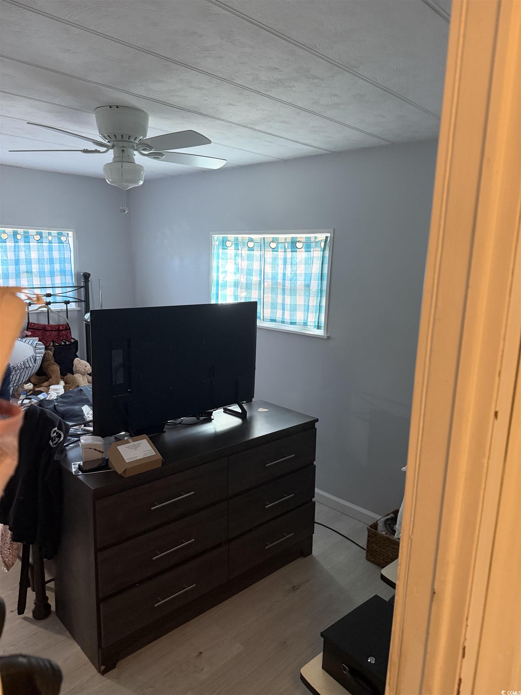 2945 Clemson Trail Murrells Inlet, SC 29576 - Photo 18 of 23 Bedroom with a ceiling fan, light wood-style floors, and an office area