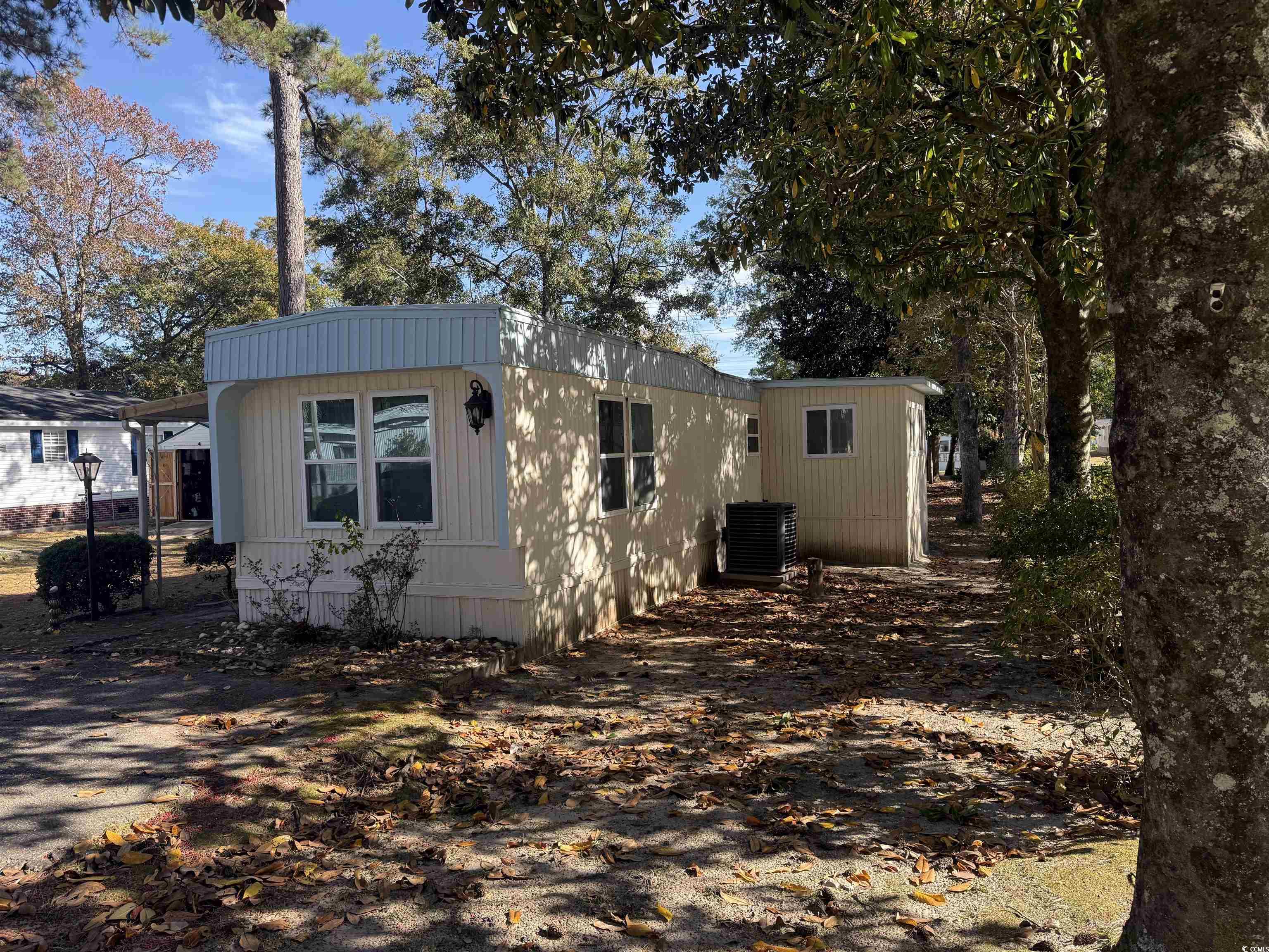 2945 Clemson Trail Murrells Inlet, SC 29576 - Photo 2 of 23 View of property exterior with a central air condition unit