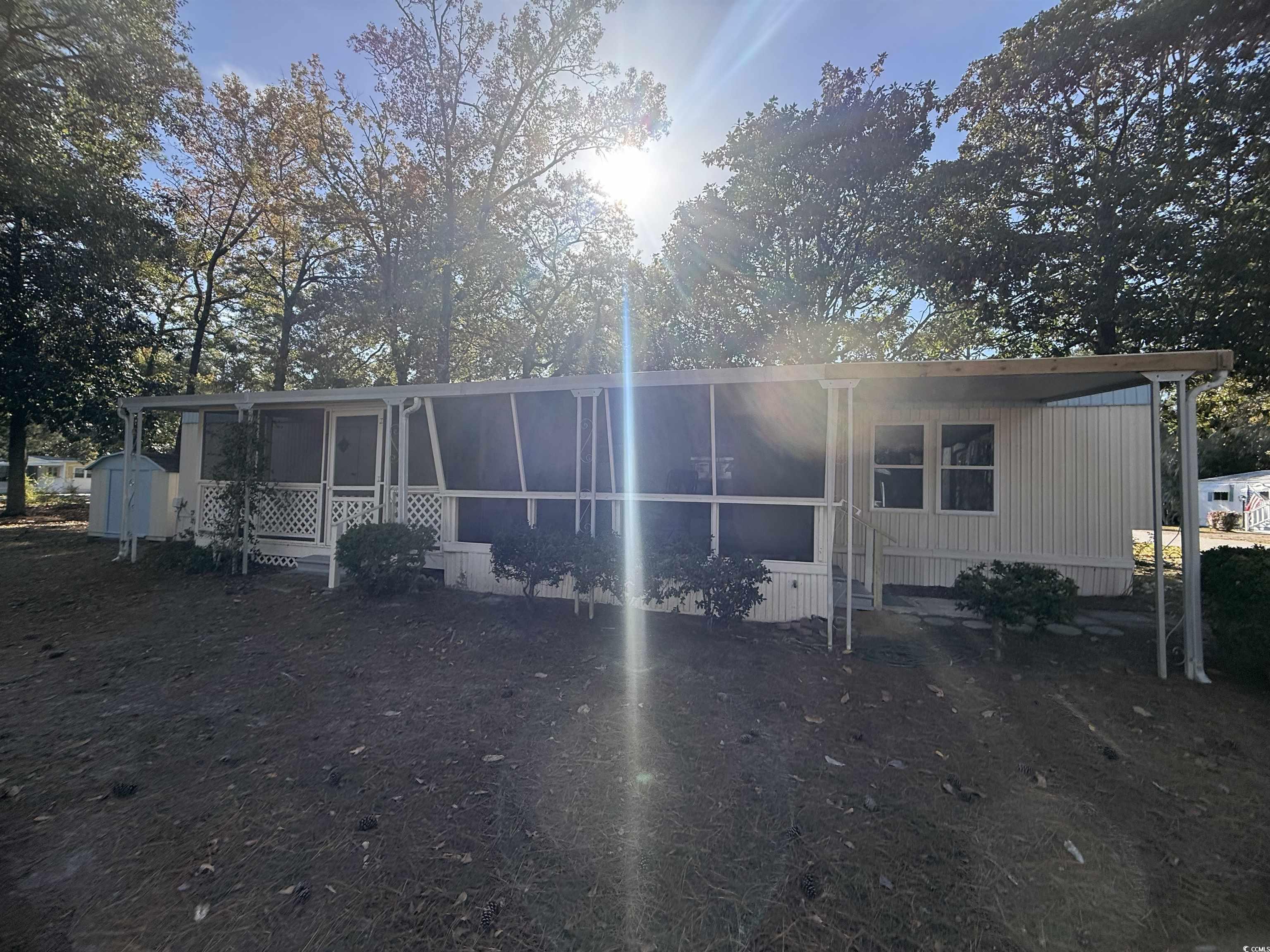 2945 Clemson Trail Murrells Inlet, SC 29576 - Photo 4 of 23 View of front of house featuring a sunroom