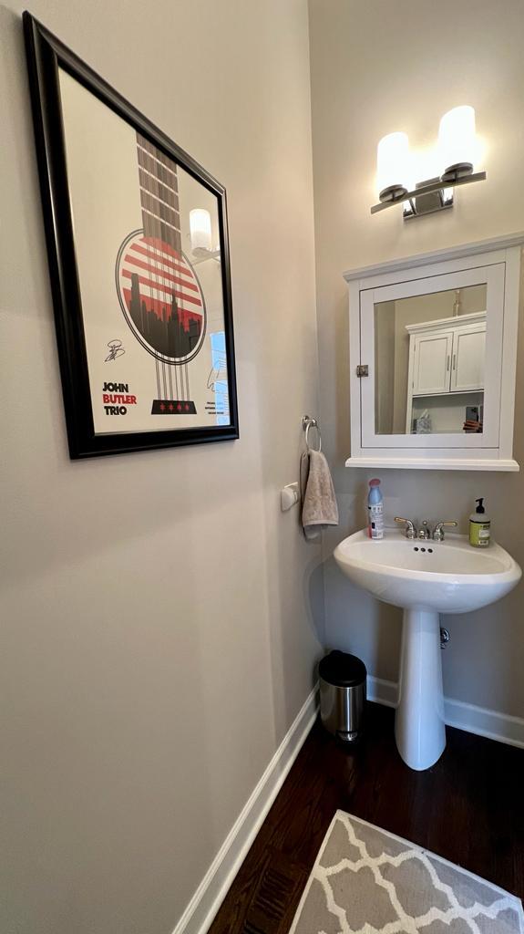 218 East Cullerton Street Chicago, IL 60616 - Photo 17 of 29 a bathroom with a sink and a mirror