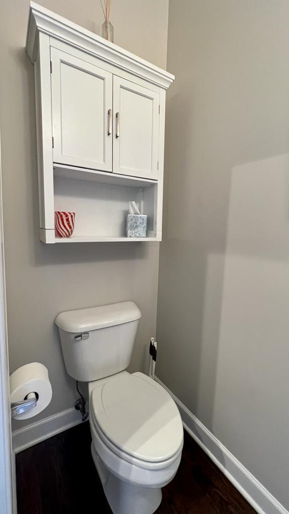 218 East Cullerton Street Chicago, IL 60616 - Photo 18 of 29 a white toilet sitting next to a bathroom sink
