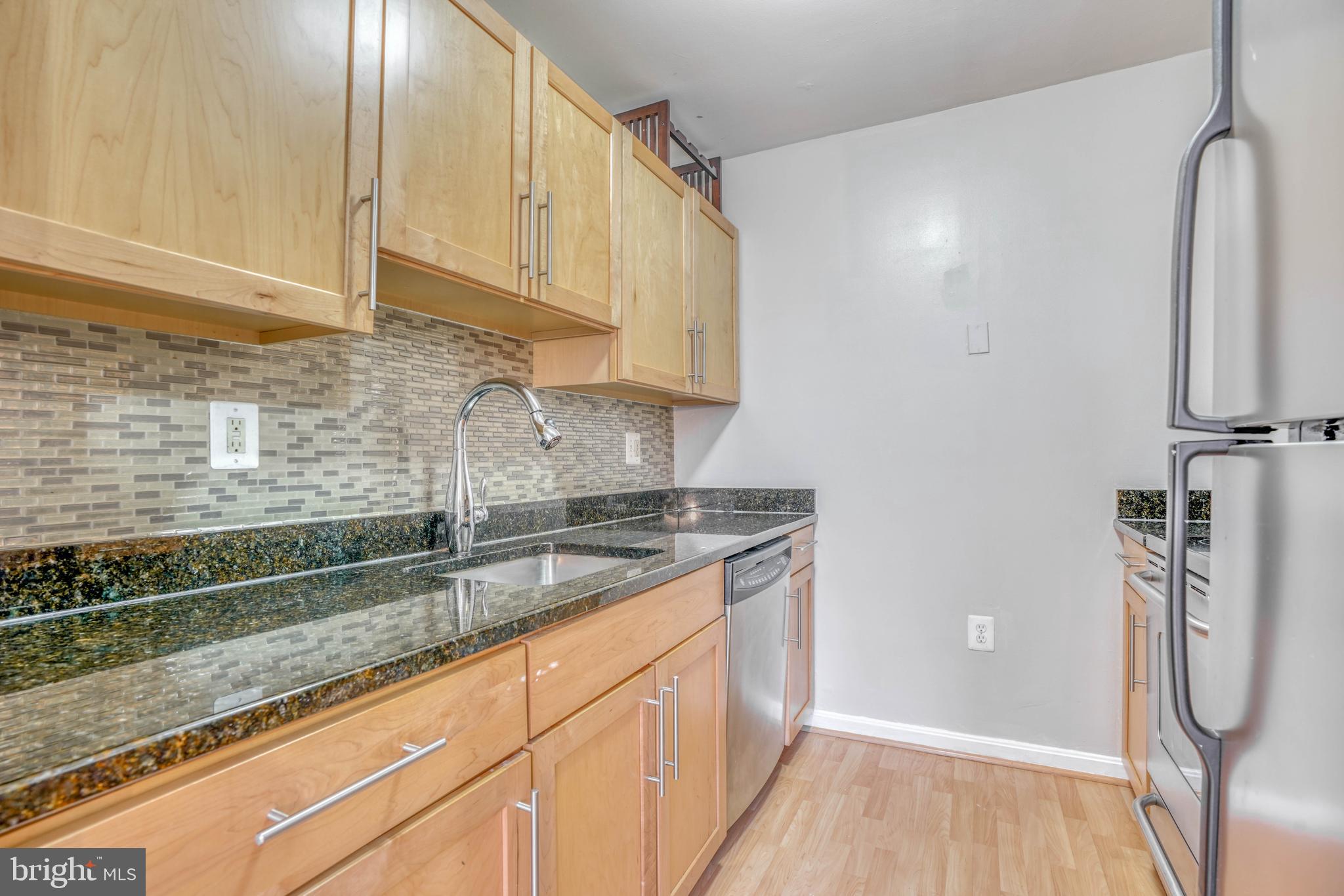 1011 Hunter Street, Unit G1 Baltimore, MD 21202 - Photo 8 of 17 Updated Kitchen with SS Appliances