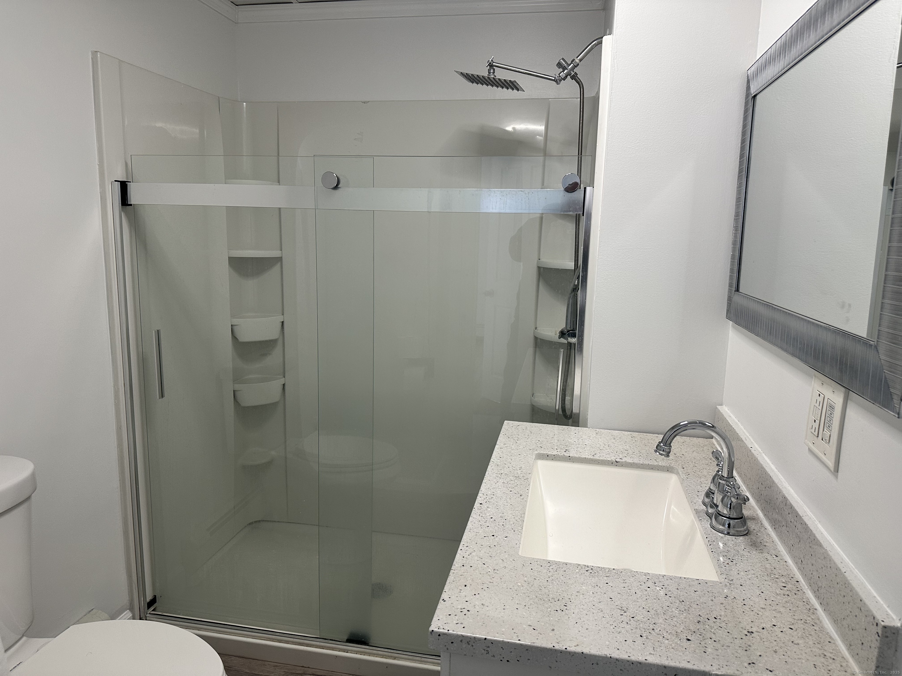 1049 Campbell Avenue West Haven, CT 06516 - Photo 12 of 20 a bathroom with a sink and toilet