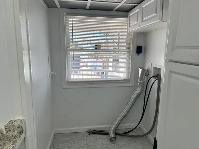 a view of a door and chair