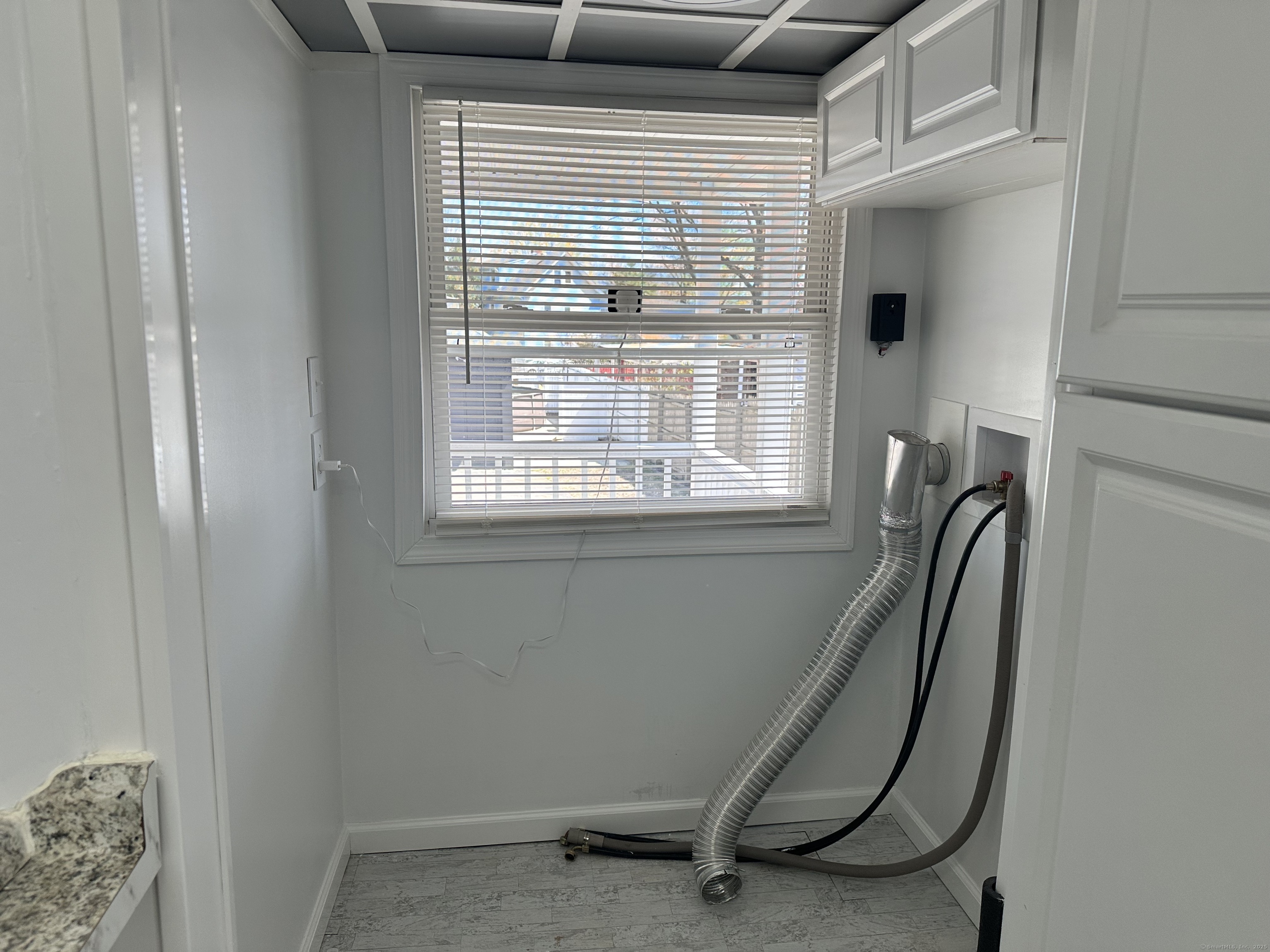 1049 Campbell Avenue West Haven, CT 06516 - Photo 17 of 20 a view of a door and chair