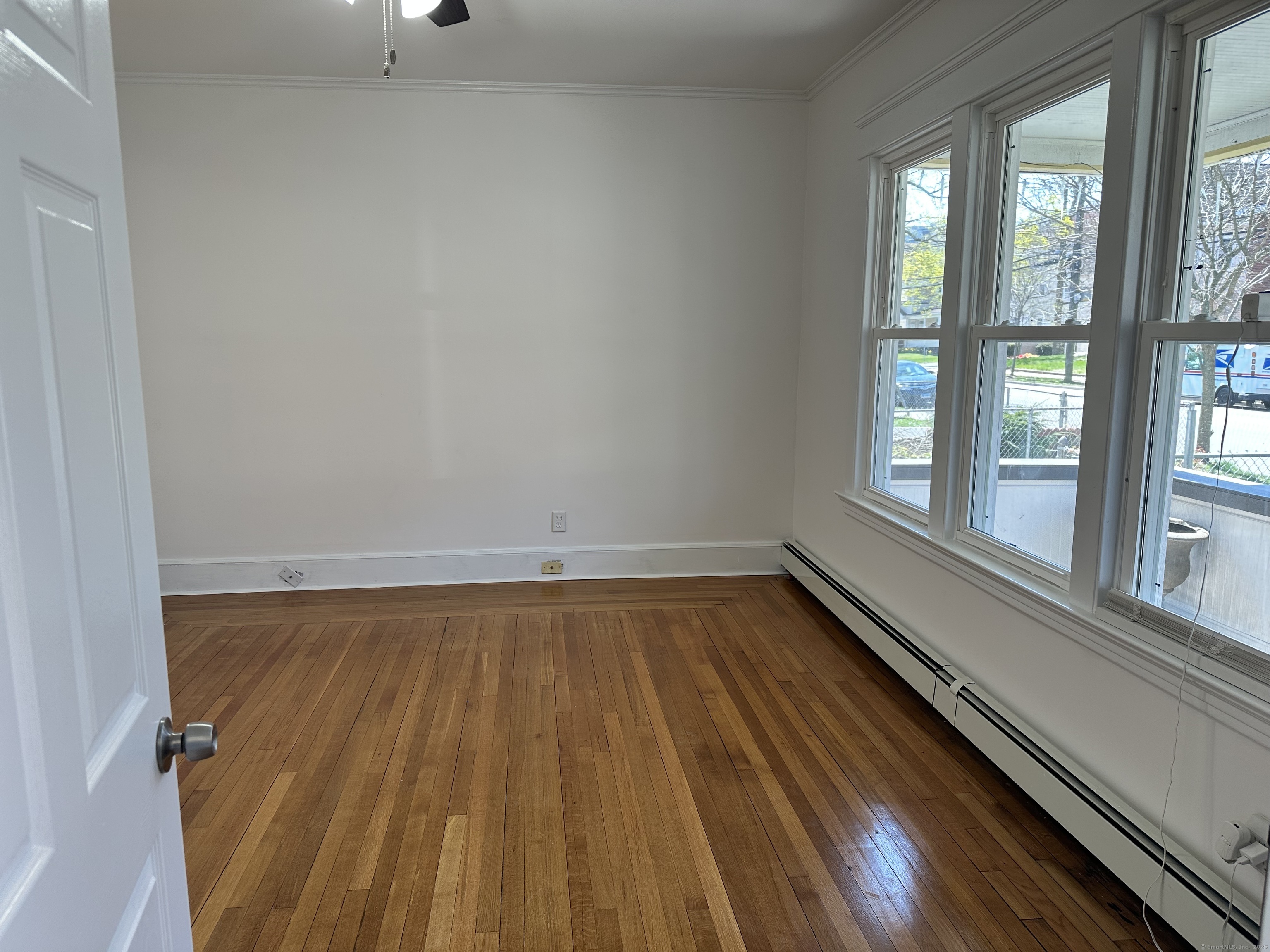1049 Campbell Avenue West Haven, CT 06516 - Photo 5 of 20 a view of a room with wooden floor and balcony