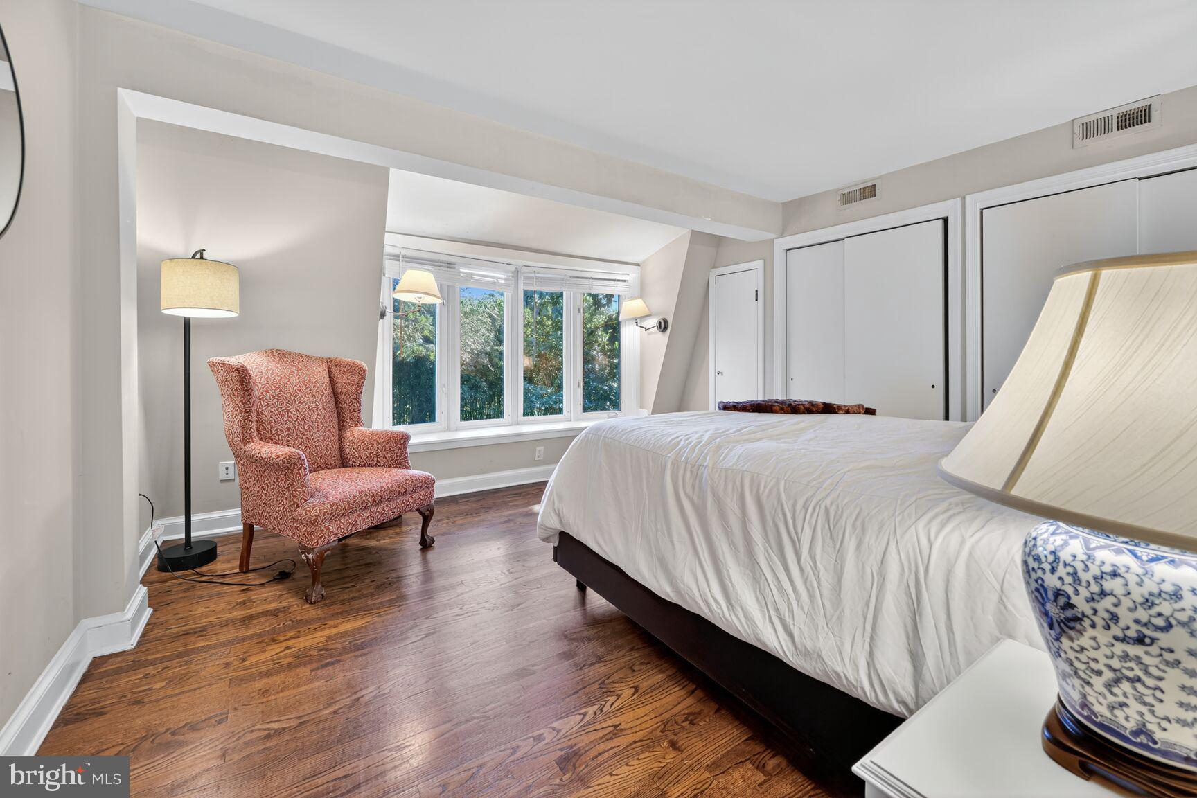 1511 34th Street Northwest Washington, DC 20007 - Photo 18 of 30 a bedroom with bed couch and window