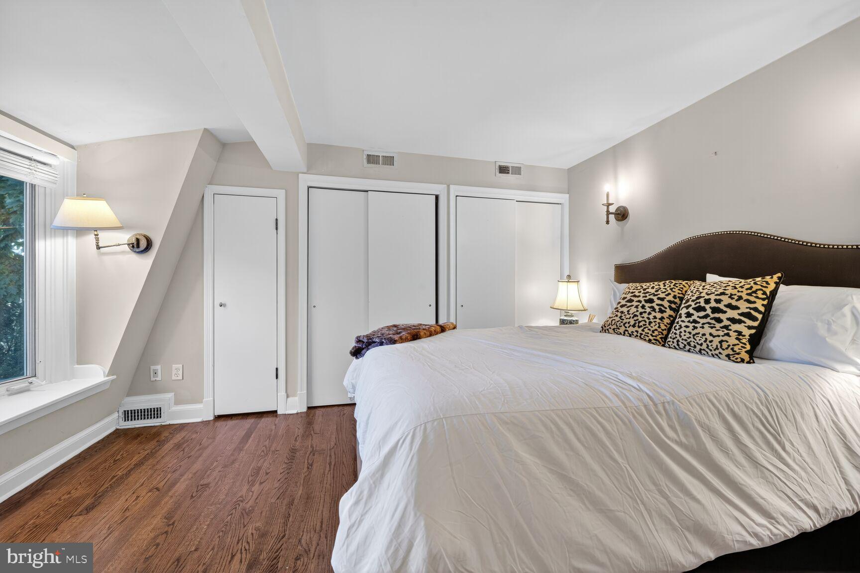 1511 34th Street Northwest Washington, DC 20007 - Photo 19 of 30 a bedroom with a bed and a window