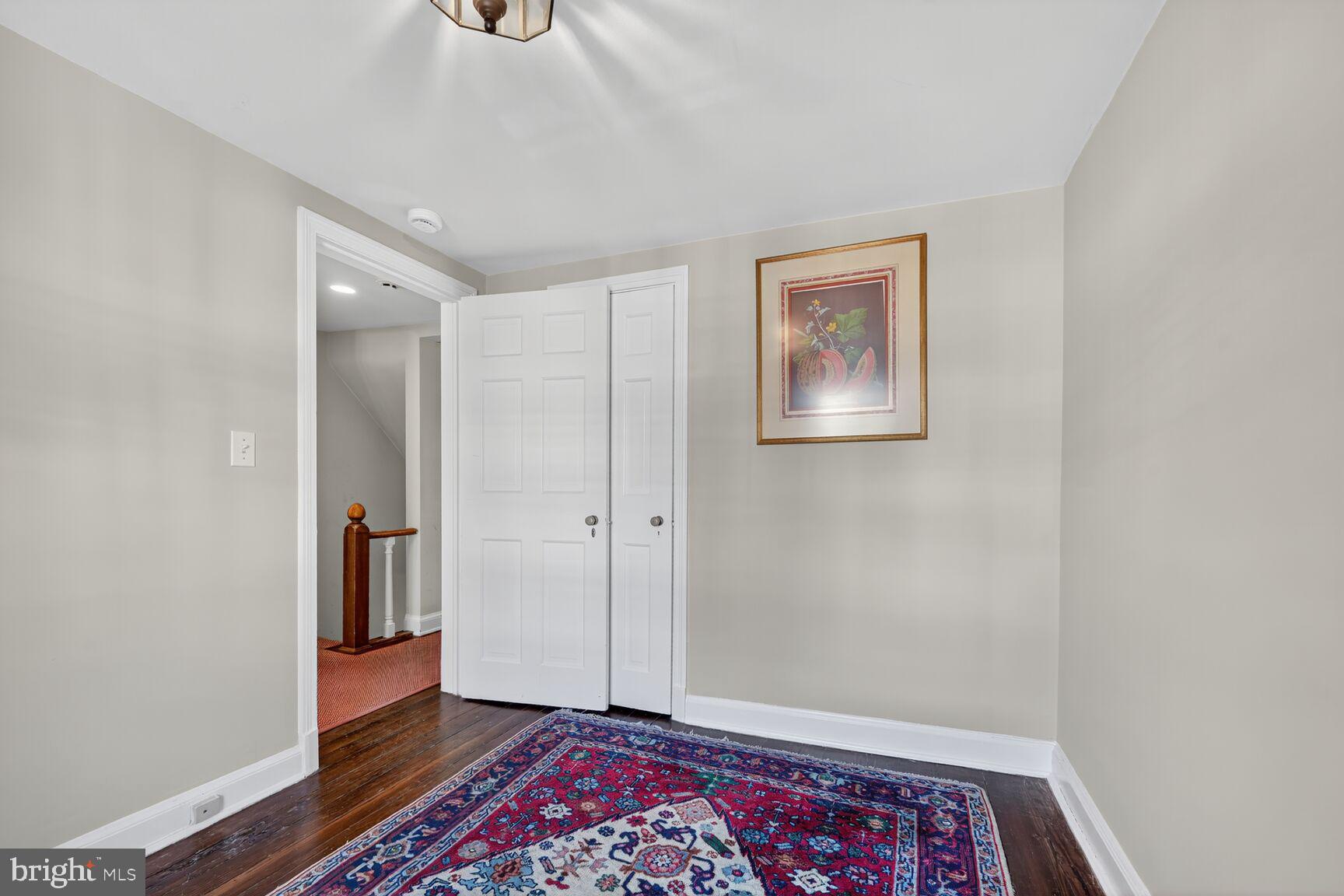 1511 34th Street Northwest Washington, DC 20007 - Photo 23 of 30 a view of an empty room and wooden floor
