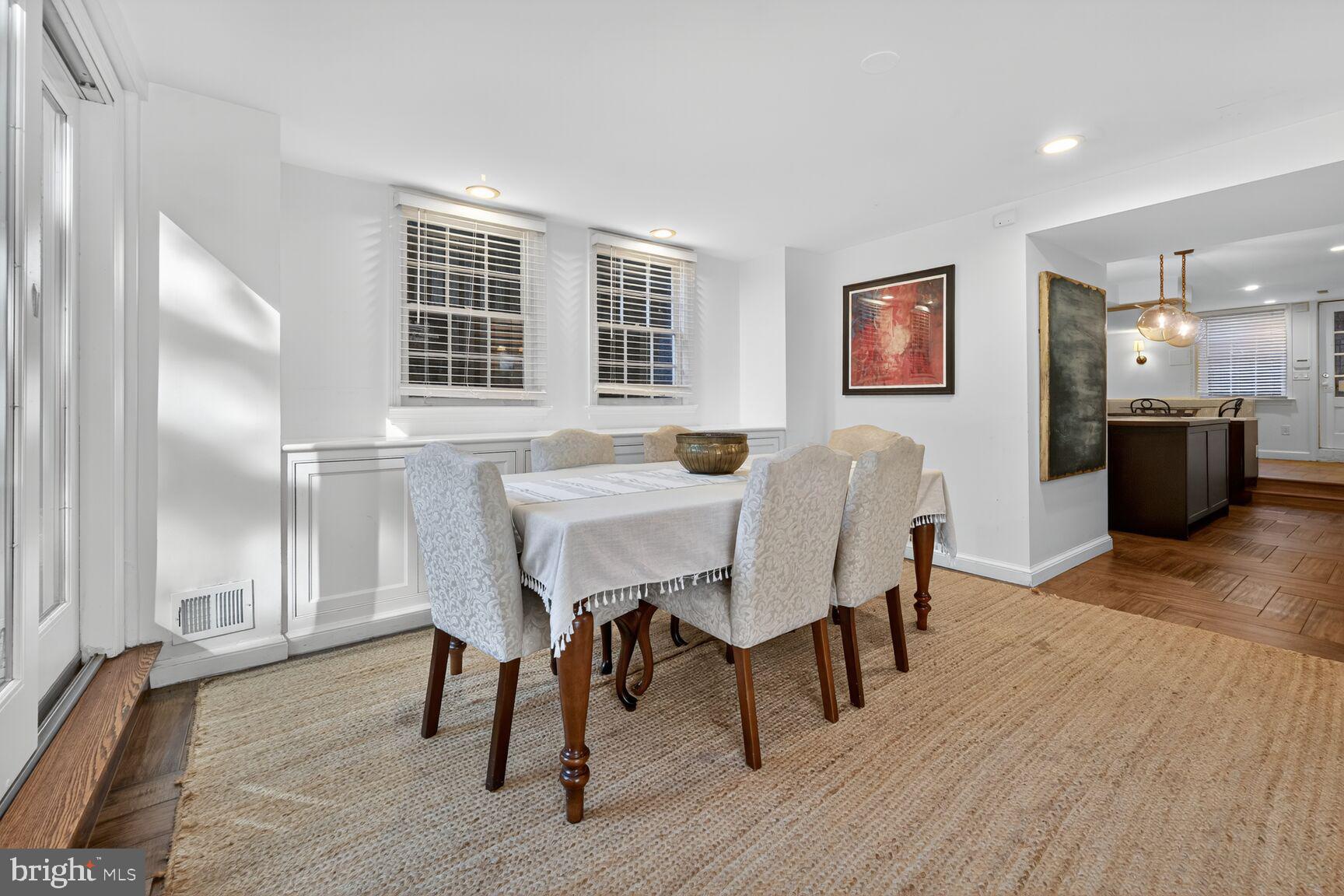 1511 34th Street Northwest Washington, DC 20007 - Photo 10 of 30 a view of a dining room with furniture and wooden floor